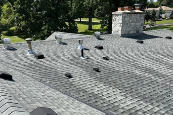 How Does a Complete Roofing System Work to Protect a Home or Building?