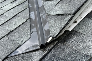 What Role Do Underlayment, Flashing, and Ventilation Play in Roof Performance?